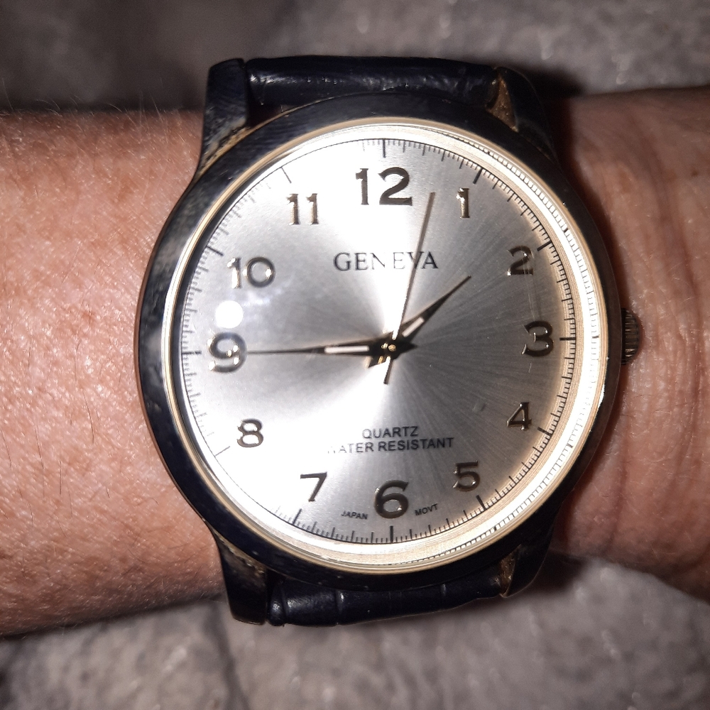 Geneva watch with black band